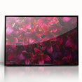 Framed wall art displaying an intricate botanical leaves design on a black background. The acrylic frame enhances the vibrant colors, making it a stunning home decor piece. Perfect for nature lovers seeking elegant interior accents.