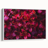 Framed botanical wall art collection showcasing vibrant flowers and intricate leaves on a white background, displayed in a side view to highlight its design.
