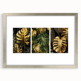 Framed botanical wall art showcasing a collection of vibrant flowers and leaves in a silver mat, ideal for enhancing home decor with a natural theme.
