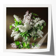 Vibrant botanical wall art print featuring delicate lilacs in soft purple and green hues, elegantly rolled for easy framing and display in any home decor.