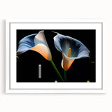 Botanical wall art featuring a delicate lily design, framed in white with a mat, showcasing elegant floral aesthetics perfect for home decor.