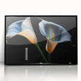 Framed botanical wall art featuring a detailed black and white lily design, set against a sleek black frame, ideal for modern home decor and floral enthusiasts.