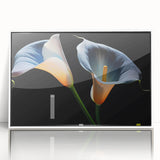 Framed botanical wall art featuring a detailed white lily design on a textured acrylic surface, perfect for adding elegance to home decor.