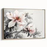 Framed wall art featuring a botanical design of magnolia flowers on canvas, with a gold frame. The artwork showcases vibrant colors and intricate details, perfect for enhancing home decor.