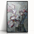 Framed wall art featuring a botanical magnolia design in a sleek black frame, showcasing vibrant colors and intricate details, perfect for home decor.