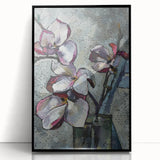 Framed wall art featuring a botanical magnolia design in a sleek black frame, showcasing vibrant colors and intricate details, perfect for home decor.