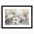 Botanical wall art featuring an elegant magnolia design in a black frame with matting, showcasing delicate floral details and adding a sophisticated touch to home decor.