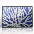 Framed wall art featuring a botanical design of marine plants, showcasing vibrant colors and intricate details, set in a sleek black frame for modern decor.