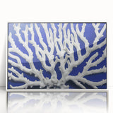 Framed wall art featuring a vibrant botanical marine plants design in shades of blue and green, showcasing intricate floral details and a sleek white frame, perfect for home decor.