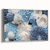 Framed canvas wall art showcasing a vibrant marine plants design, featuring intricate botanical details in shades of blue and green, complemented by a sleek silver frame.