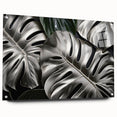 Botanical wall art featuring a Monstera plant design printed on acrylic glass, displayed in a side view with visible mounting pins, showcasing vibrant colors and intricate details, perfect for modern home decor.
