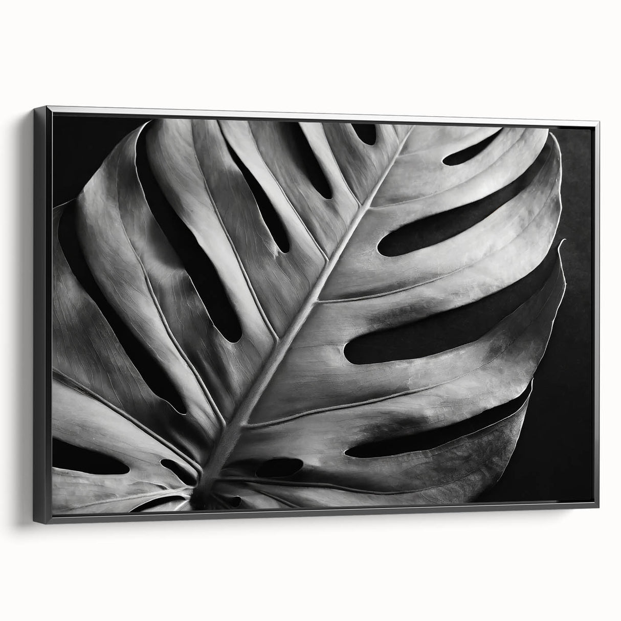 Framed wall art featuring a botanical monstera design in vibrant green hues, showcasing intricate leaf details against a black background, perfect for modern decor.