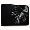 Colorful botanical wall art featuring a Monstera leaf design printed on acrylic glass, displayed from a side view with decorative pins, perfect for home decor.