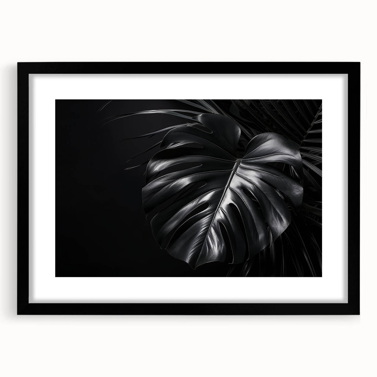 Botanical wall art featuring a Monstera design, framed in black with a mat, showcasing vibrant green leaves against a white background, ideal for modern decor.