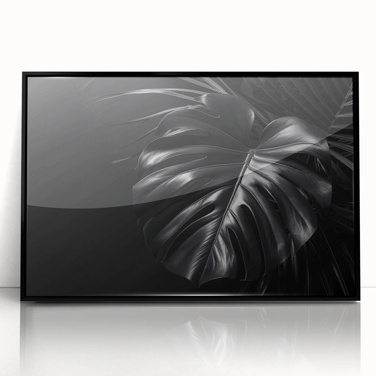 Framed wall art featuring a botanical Monstera design in vibrant greens and blacks, elegantly displayed in a sleek black frame, perfect for enhancing modern decor.