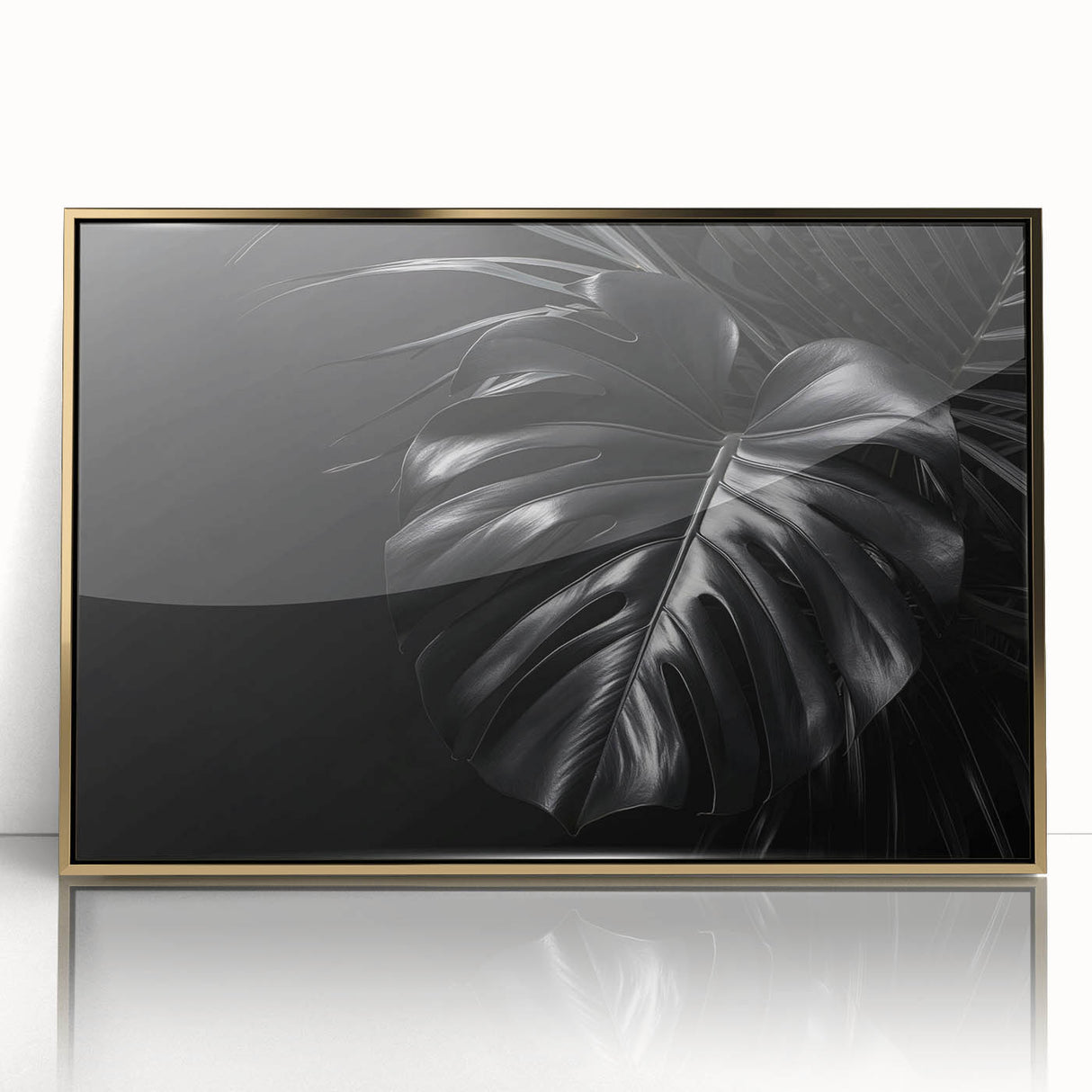 Framed botanical wall art featuring a Monstera leaf design in vibrant green tones, presented in an elegant gold frame, perfect for home decor enhancement.