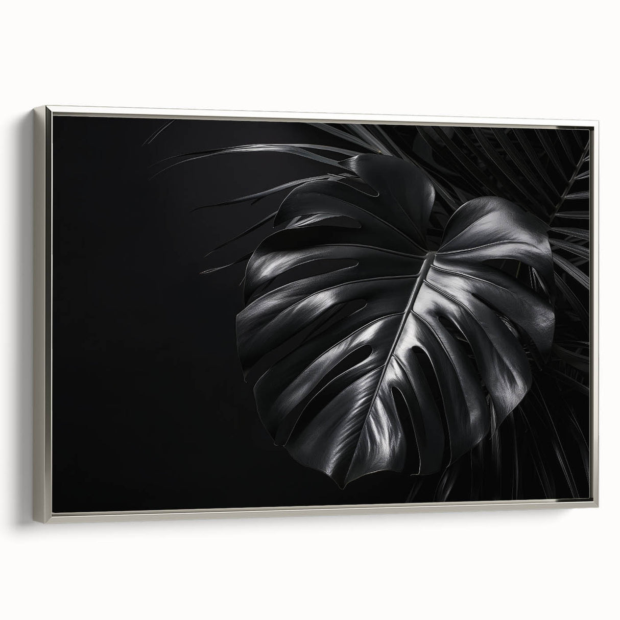 Framed wall art featuring a botanical design of a Monstera plant in vibrant green hues, elegantly displayed against a silver frame, ideal for modern decor.
