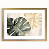 Botanical wall art featuring a gold-framed Monstera design with a mat, showcasing vibrant green leaves against a neutral background, ideal for modern decor.