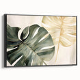 Framed botanical wall art featuring a Monstera plant design, presented in a sleek black frame with a side view showcasing its textured canvas surface. Ideal for modern home decor.