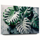 Acrylic wall art featuring a botanical monstera design, showcasing lush green leaves and intricate details, displayed from a side view on a white background. Perfect for home decor enthusiasts seeking tropical-inspired artwork.