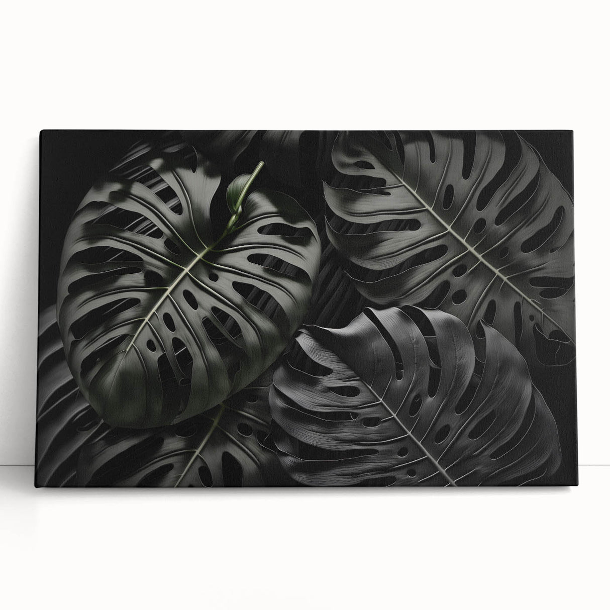Vibrant botanical wall art featuring a monstera leaf design on stretched canvas, beautifully displayed leaning against a neutral wall, ideal for modern decor.