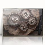 Framed wall art featuring a botanical design of colorful flowers and mushrooms, set in a sleek silver frame, ideal for enhancing modern home decor.