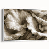 Framed canvas wall art showcasing a botanical design of vibrant flowers and mushrooms, presented in a sleek white frame, ideal for nature-inspired decor.