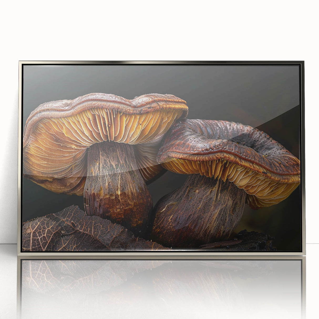 Framed wall art featuring a botanical design of colorful flowers and mushrooms, displayed in a sleek silver frame, perfect for home decor.