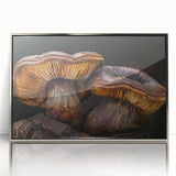 Framed wall art featuring a botanical design of colorful flowers and mushrooms, displayed in a sleek silver frame, perfect for home decor.