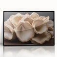 Framed wall art featuring a botanical design of colorful flowers and mushrooms, set against a sleek black background, ideal for modern home decor.