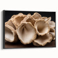 Framed canvas art showcasing a botanical design of colorful flowers and mushrooms, featuring a sleek black frame and side view perspective, ideal for home decor.