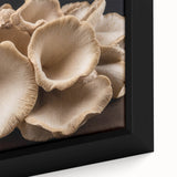 Close-up of a framed canvas wall art featuring a vibrant botanical design of colorful flowers and mushrooms, showcasing intricate details and textures, ideal for home decor.