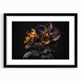 Black-framed wall art featuring a botanical orchid design, showcasing vibrant colors and intricate details, perfect for enhancing interior decor.