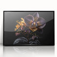 Framed wall art featuring a botanical orchid design, showcasing vibrant colors and intricate details, set in a sleek black frame, perfect for modern home decor.