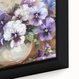 Close-up of a framed botanical wall art piece showcasing vibrant pansy flowers in a rich color palette, perfect for home decor enthusiasts seeking floral elegance.