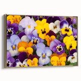Framed botanical wall art depicting vibrant pansies in shades of purple and gold, showcasing intricate details and a sophisticated side view for elegant decor.