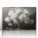 Framed wall art piece featuring a botanical design of peonies, elegantly displayed in a silver-acrylic frame, perfect for enhancing home decor with floral elegance.
