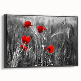 Framed canvas wall art featuring a vibrant botanical poppy design, set against a sleek black background, showcasing the artwork from a side view for depth and dimension.