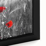 Close-up of a framed botanical poppy wall art design showcasing vibrant red and orange flowers against a soft beige background, perfect for home decor.