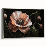 Framed botanical wall art featuring a vibrant poppy design on canvas, elegantly showcased with a silver frame, ideal for enhancing home décor in living spaces.