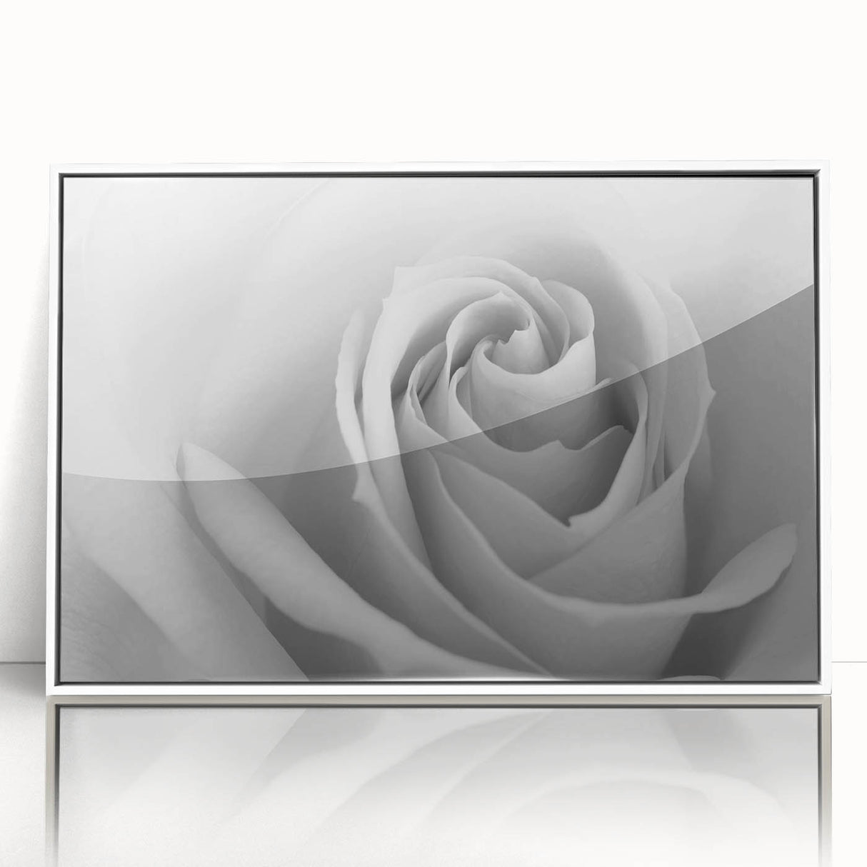 Framed botanical wall art featuring a delicate rose design, displayed in a sleek white frame, perfect for adding elegance to any room decor.