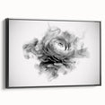 Framed botanical wall art featuring a beautifully detailed rose design on canvas, set against a sleek black frame, perfect for home decor. Ideal for floral enthusiasts.