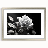 Botanical rose wall art piece framed in silver with matting, showcasing intricate floral details in soft pink and green tones, perfect for home decor.