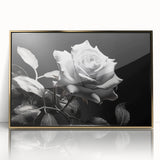 Framed wall art showcasing a botanical rose design in vibrant colors, set in an elegant gold frame, perfect for adding a touch of sophistication to home decor.