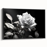 Framed wall art featuring a botanical rose design on a textured canvas, showcased from the side with a sleek black frame, perfect for home decor.