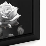 Close-up of a framed botanical rose wall art piece showcasing intricate details of pink and green hues, perfect for enhancing home decor with a touch of nature's beauty.