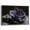 Framed wall art showcasing a botanical design with succulents in vibrant greens and earthy tones, presented from the side view against a black frame, ideal for home decor.