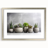 Botanical wall art collection featuring an elegant silver-framed design with lush succulent illustrations, perfect for home decor. Ideal for plant lovers seeking a modern aesthetic.