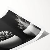 Botanical wall art print showcasing an elegant design of assorted succulents in vibrant green tones, rolled for easy display and shipping in protective packaging.