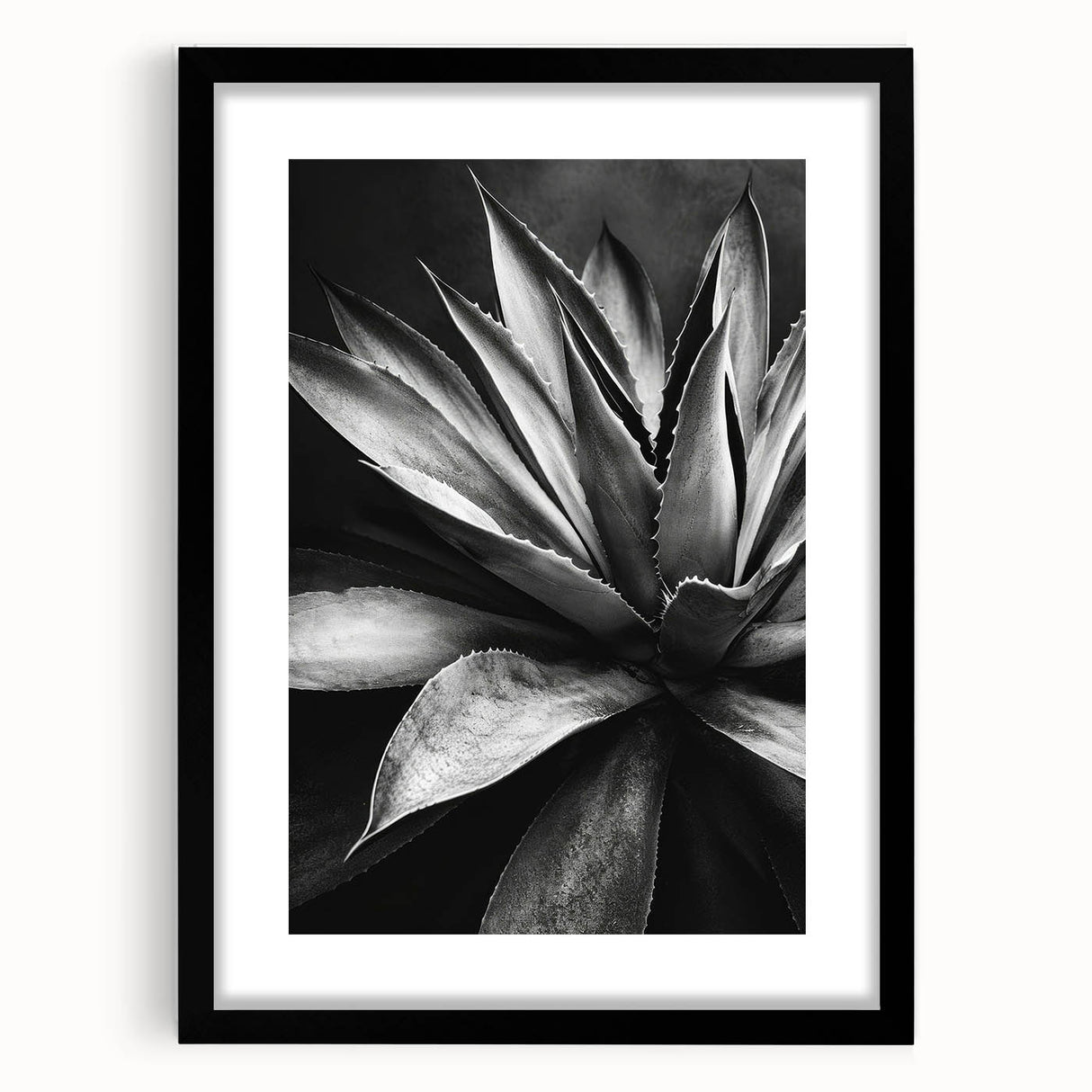 Framed botanical wall art showcasing a vibrant succulent design in a sleek black frame with a mat, ideal for home decor and nature enthusiasts.